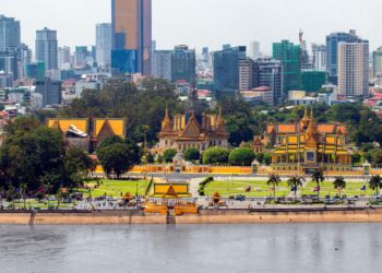 View of the royal palace and skyscrapers in phnom penh cambodia before Buying a Condo in Cambodia